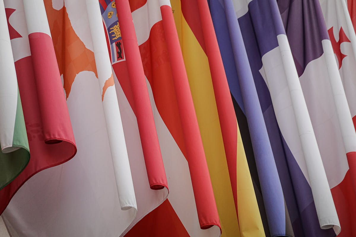 assorted international flags hanging assorted international flags hanging