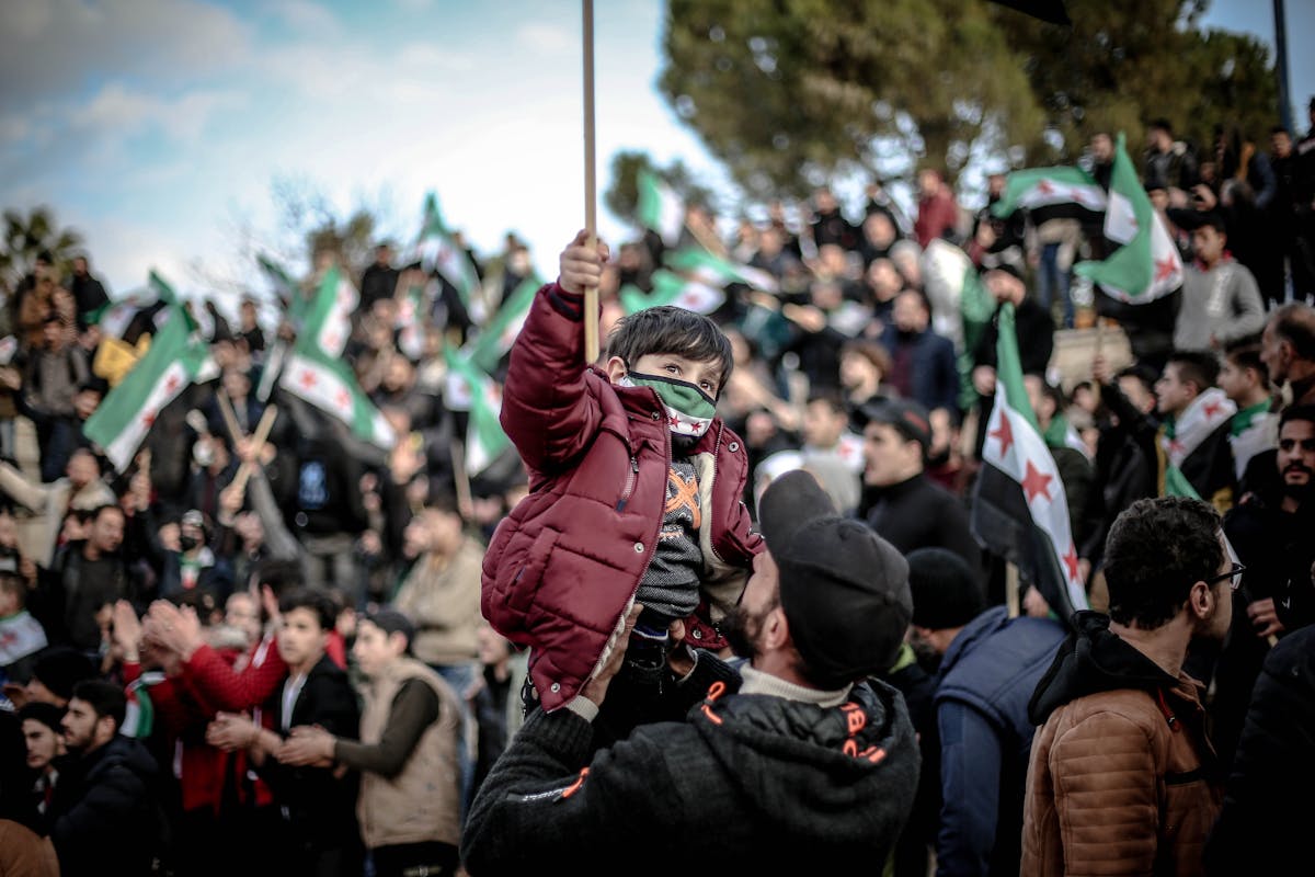 boy on protest in syria boy on protest in syria