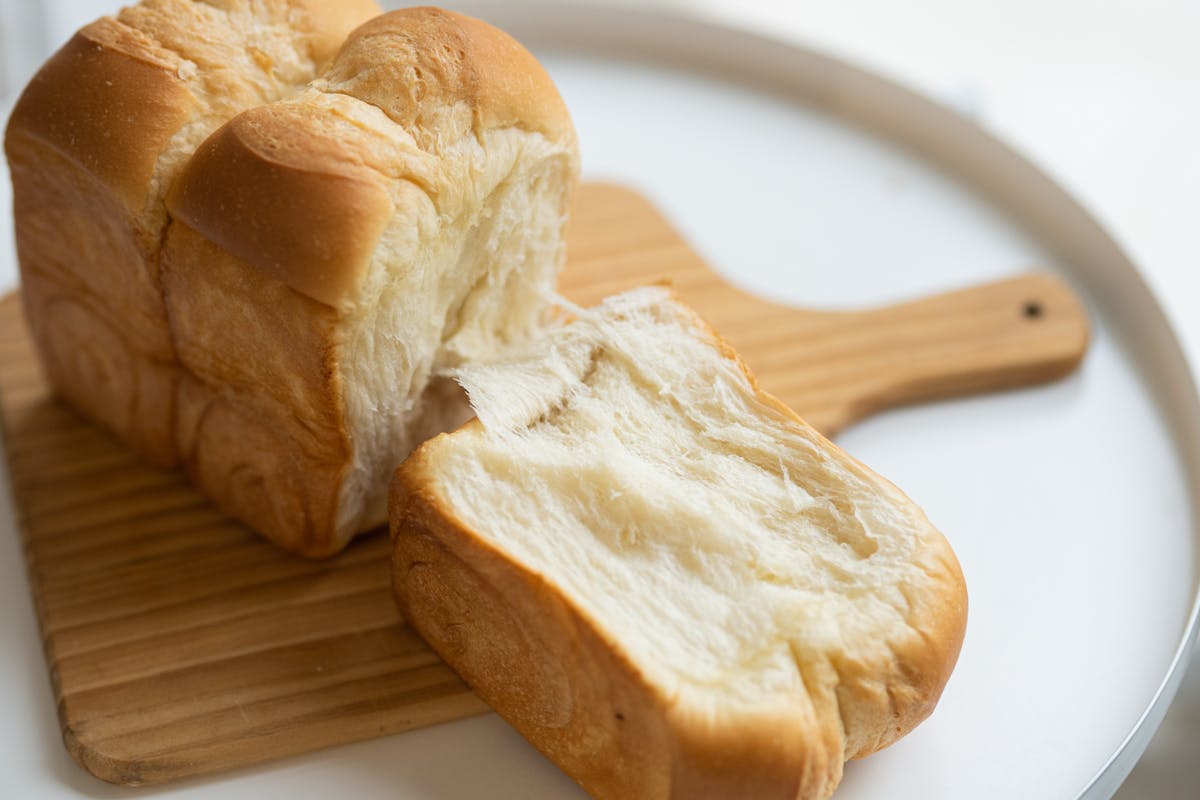 buns on a wooden chopping board