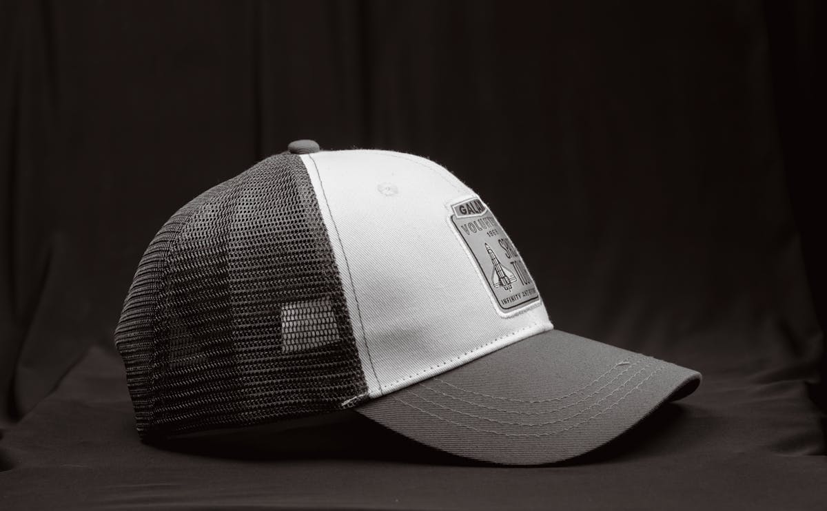 close up of a baseball cap with a patch
