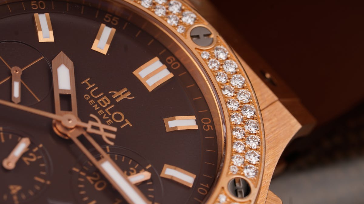 close up photo of gold watch