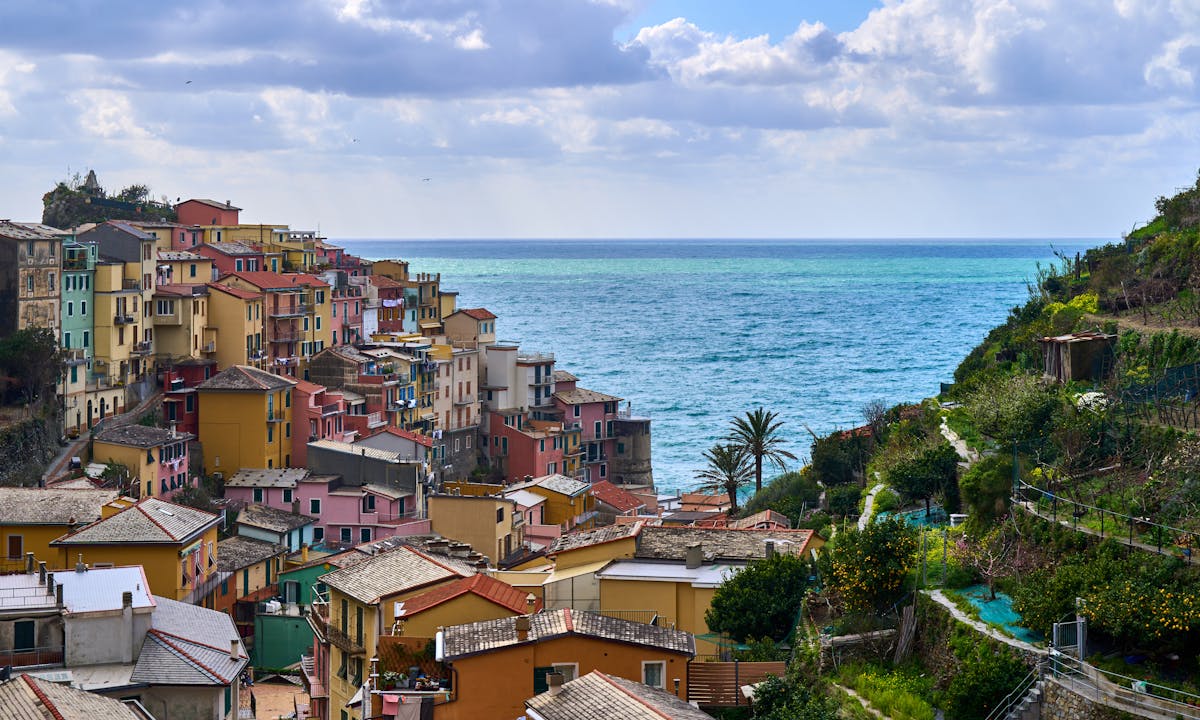 colorful coastal village overlooking ocean