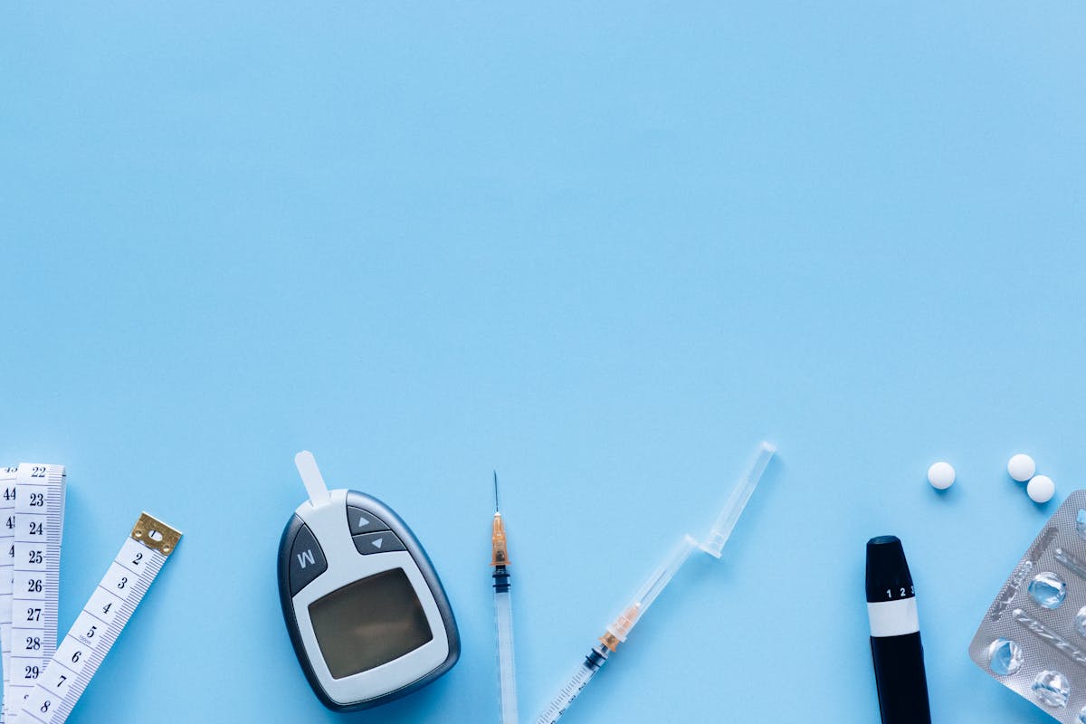 digital blood sugar meter with injections and medication