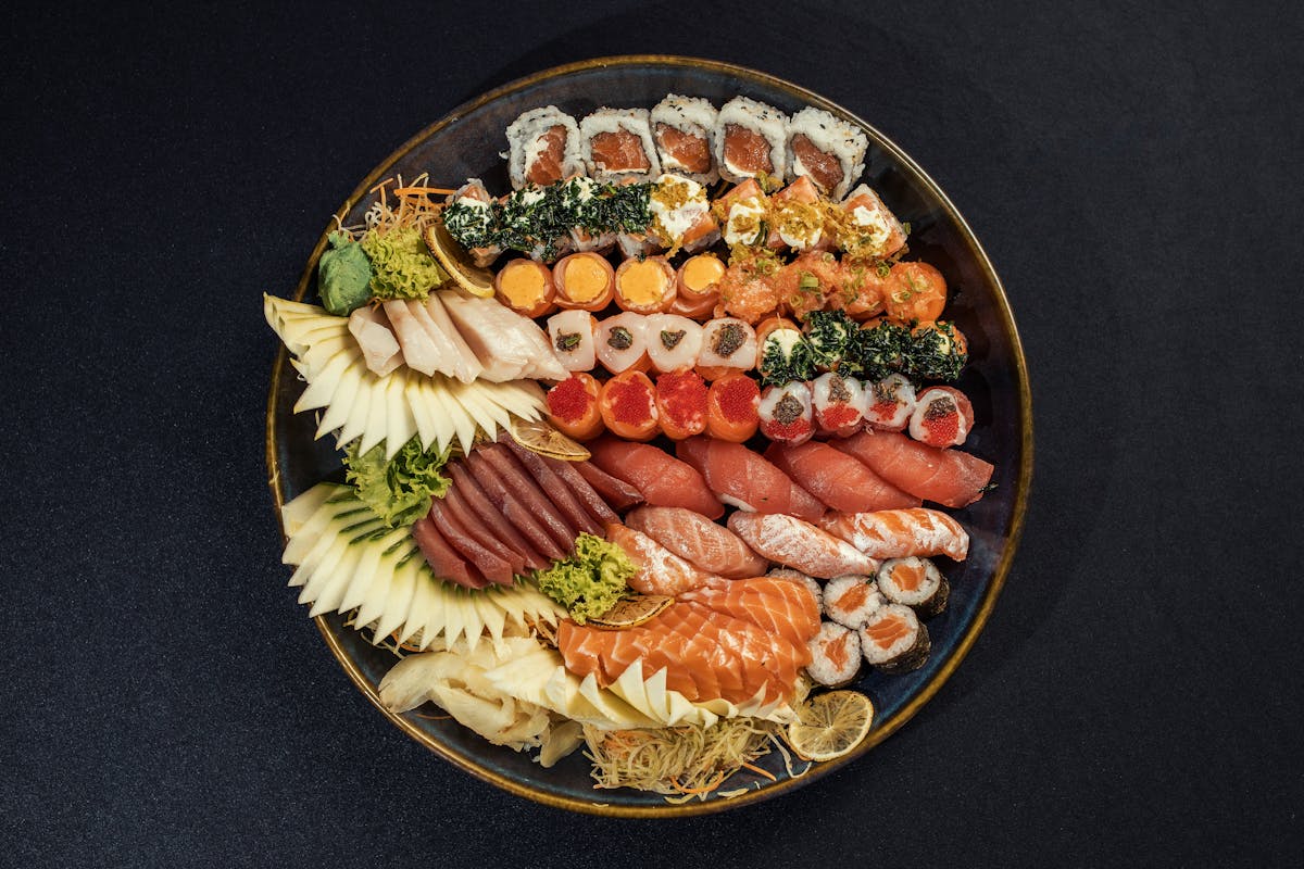 elegant assorted sushi platter on dark background