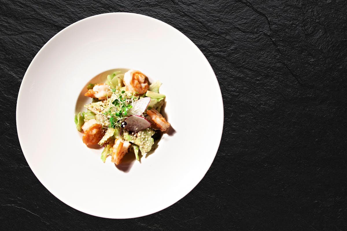 flat lay photography of vegetable salad on white ceramic plate