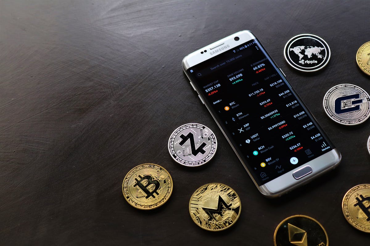 gold iphone 6 on black wooden table