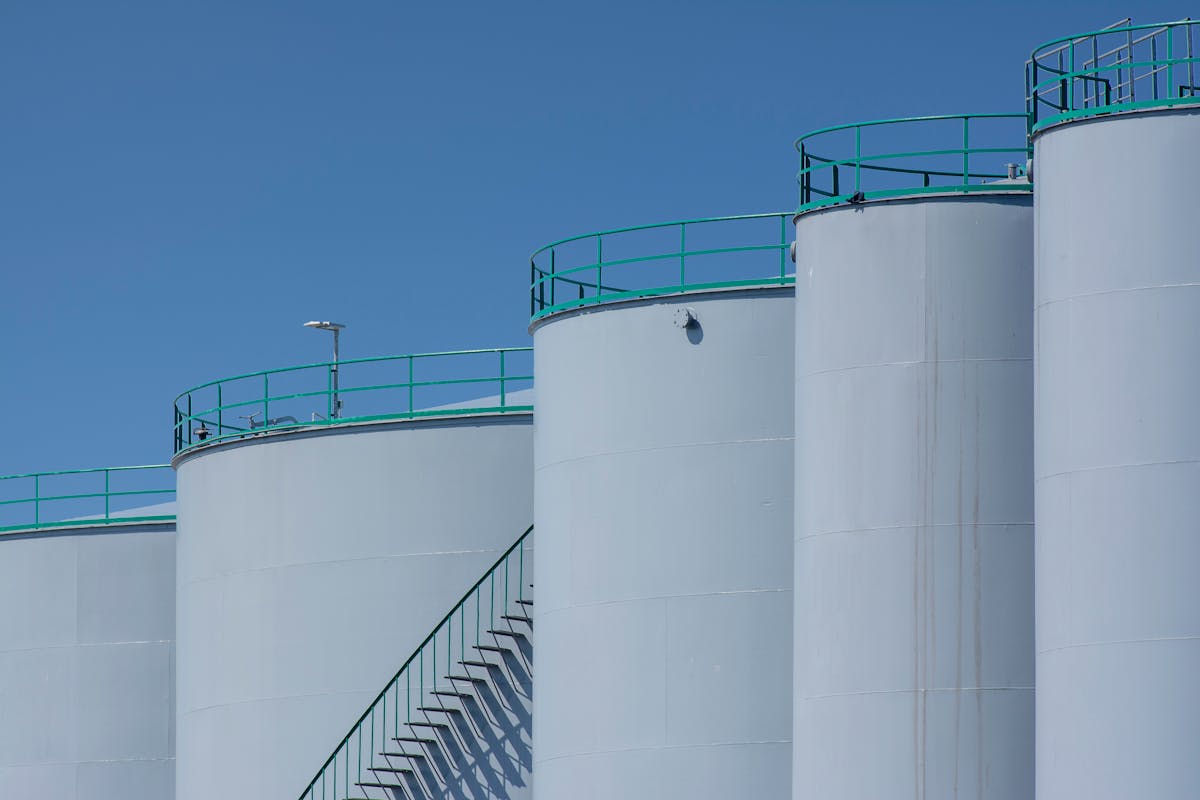 industrial storage tanks against blue sky industrial storage tanks against blue sky