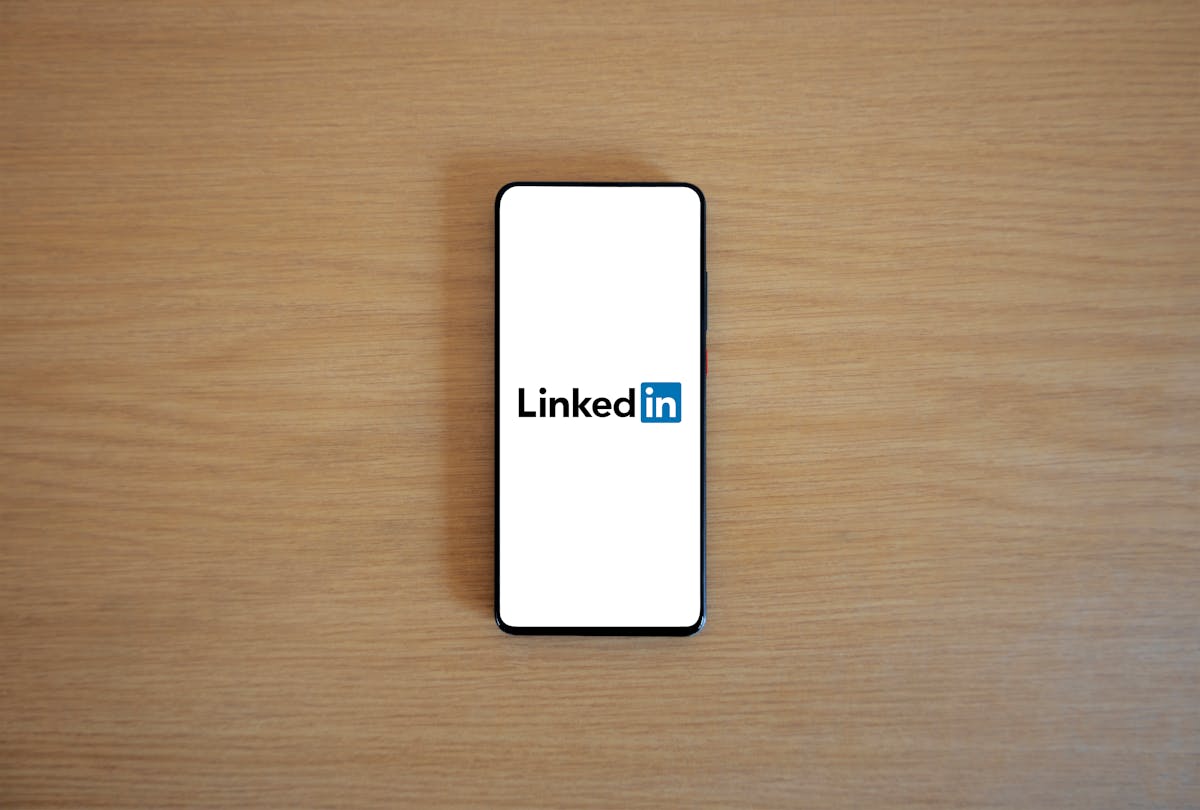 linkedin logo on smartphone linkedin logo on smartphone