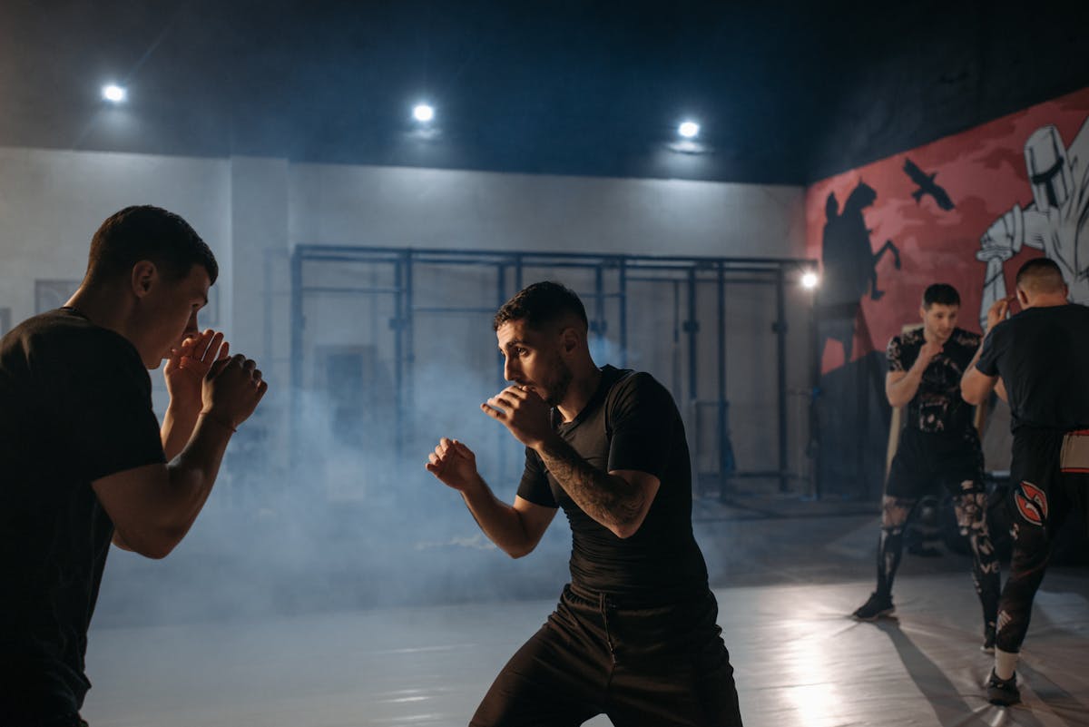 men having sparing fight