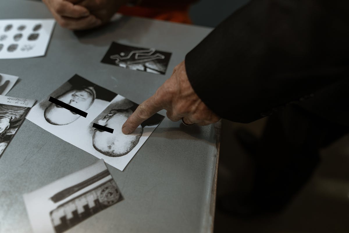 person holding white printer paper