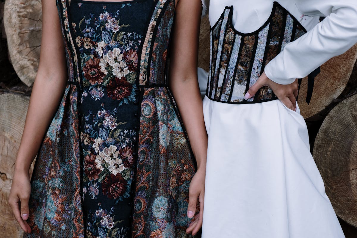 two people in stylish outfits